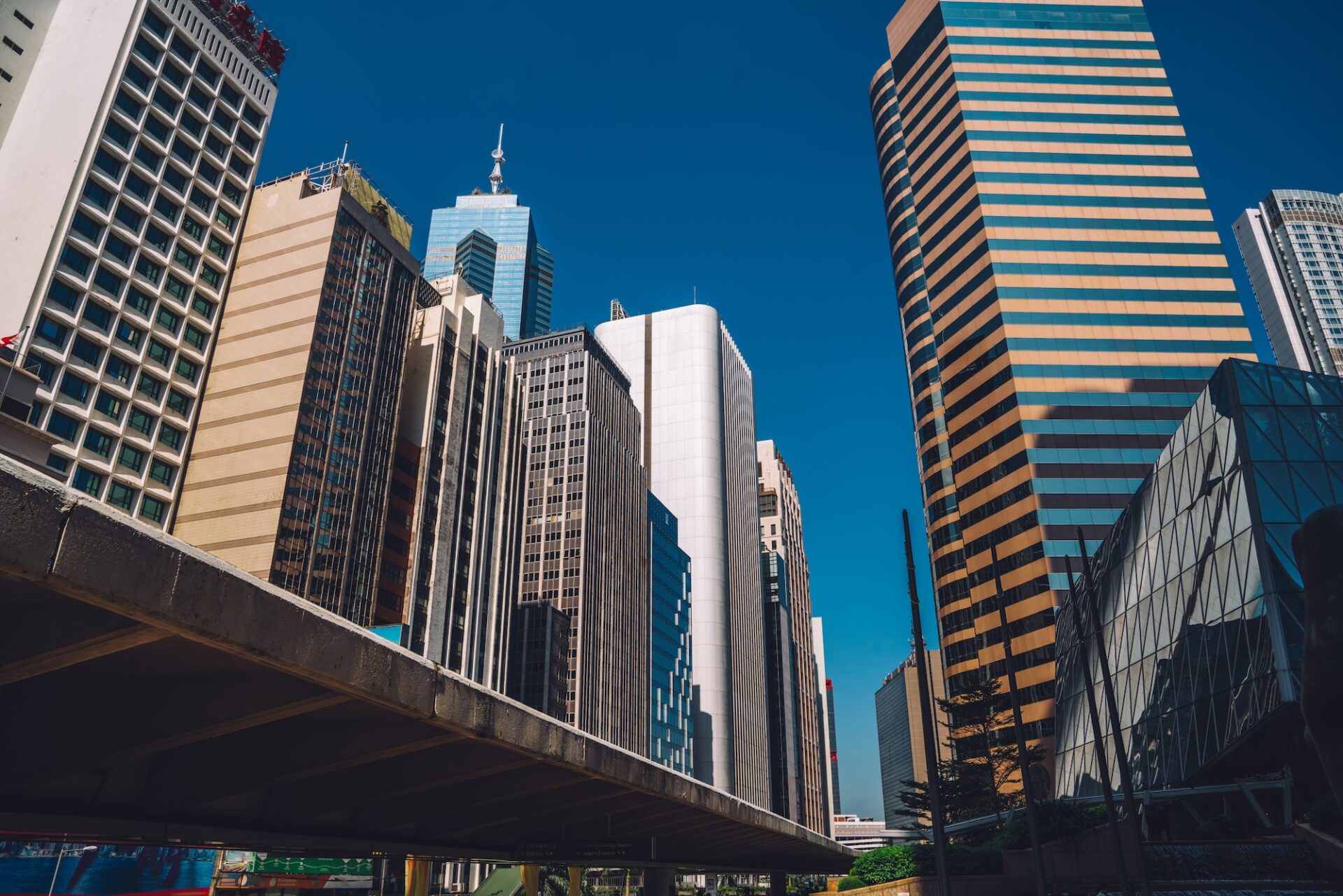 high skyscraper rising in downtown with offices and corporate headquarters